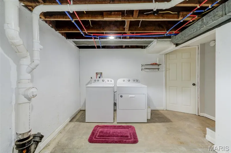 ONE partially finished room in the basement has laundry for your guests. — 2009 N 3rd Street, St Charles, MO 63301