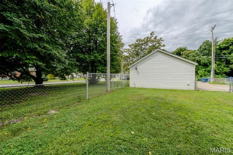 A view from the patio.  4 concrete drive spaces with off-alley access. — 2009 N 3rd Street, St Charles, MO 63301
