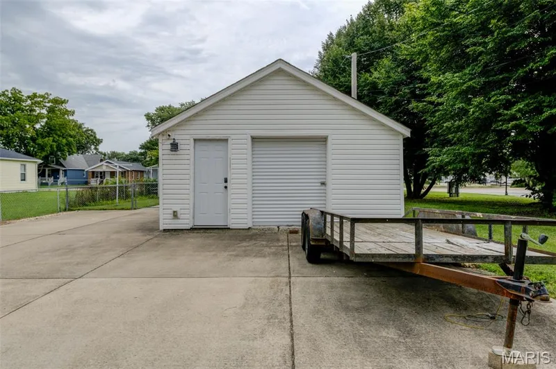 The "garage" does not have auto access - used as a large storage shed. — 2009 N 3rd Street, St Charles, MO 63301