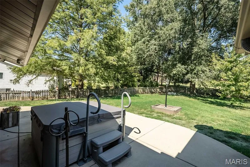 Hot tub on rear patio — 1538 Woodroyal West Drive, Chesterfield, MO 63017