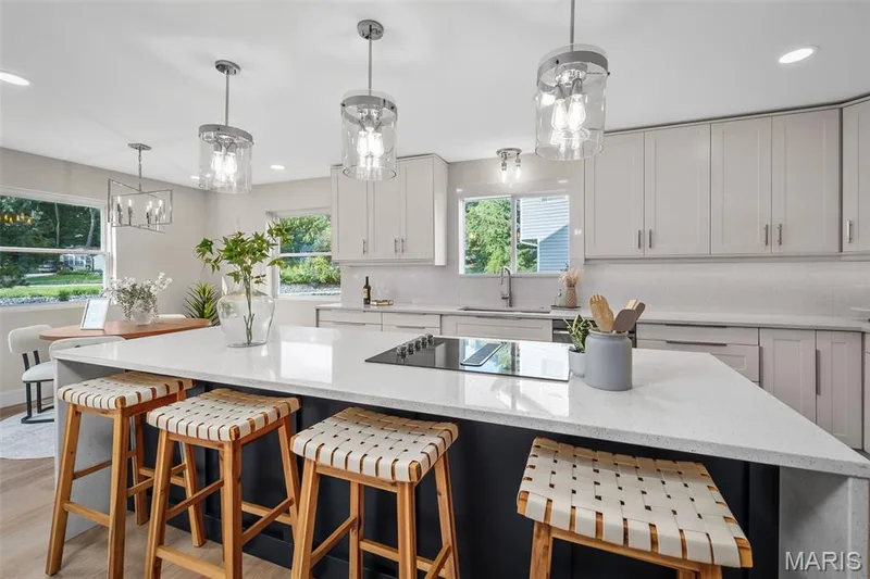 Look at the size of that island! Look at those pendant lights!! — 14 Bayside Court, Lake St. Louis, MO 63367