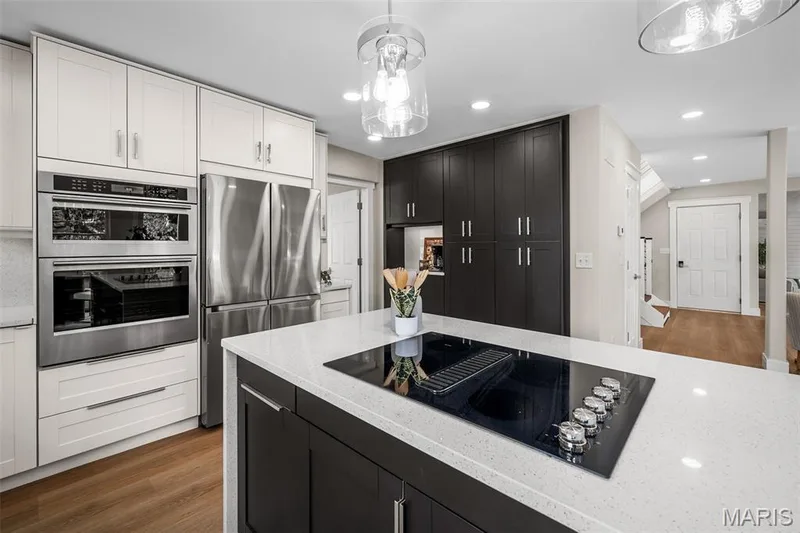 Electric cooktop, Kitchen Aid convection oven, built in microwave, and the refrigerator stays! — 14 Bayside Court, Lake St. Louis, MO 63367