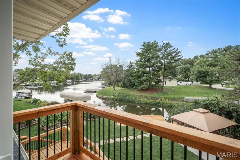Wake up to a pretty lake view. — 14 Bayside Court, Lake St. Louis, MO 63367