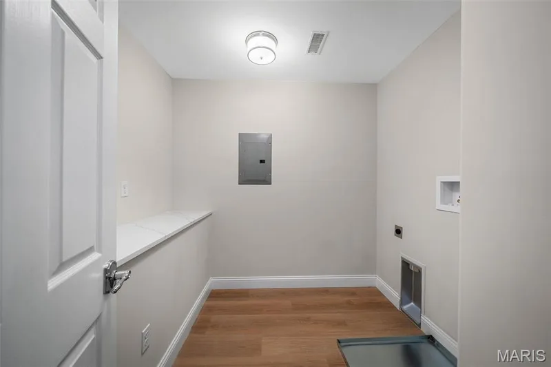 Second floor laundry with folding area. Electric dryer hook-up — 14 Bayside Court, Lake St. Louis, MO 63367