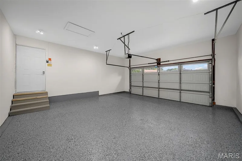 Garage has epoxied floor & 400 amp service. — 14 Bayside Court, Lake St. Louis, MO 63367