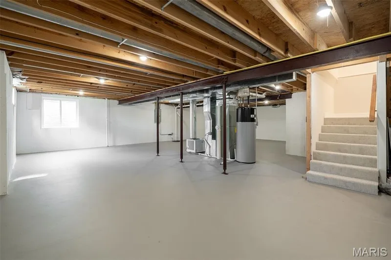 Unfinished lower level has egress window, rough-in for bathroom. — 14 Bayside Court, Lake St. Louis, MO 63367