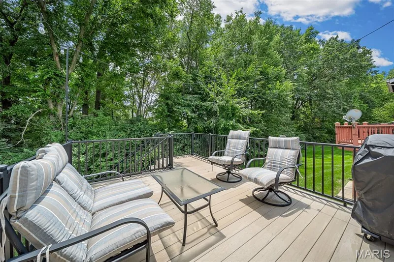 Private deck backing to trees — 605 Timber Creek Trail, O'Fallon, MO 63368