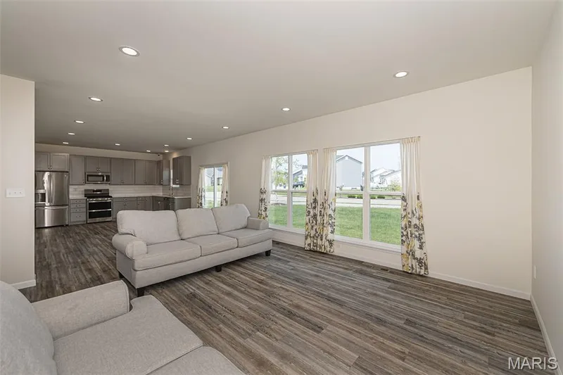 Great Room with recessed lighting and lots of natural light! — 812 Colony Ridge Court, Foristell, MO 63348