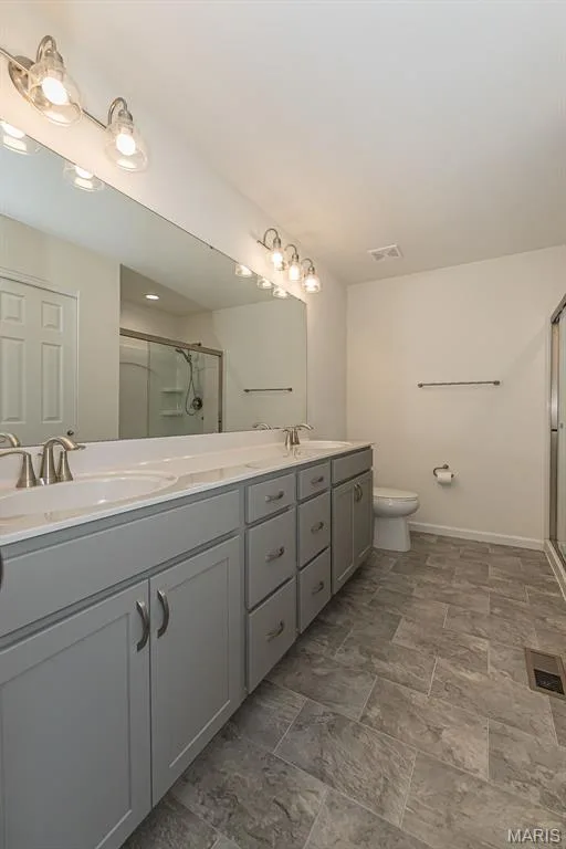 Primary Bathroom has double vanity. — 812 Colony Ridge Court, Foristell, MO 63348