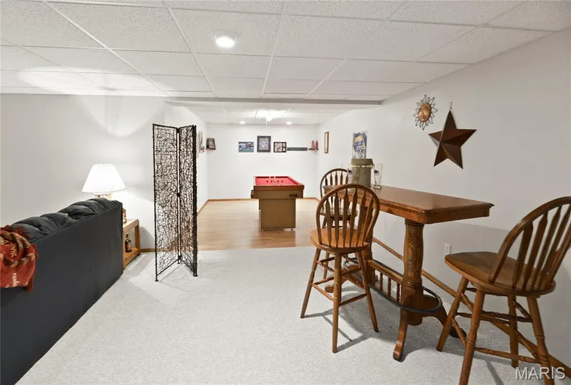 Recessed lighting, wood-finish flooring, drop ceiling, white walls, and carpeting — 38 Fawn Valley Circle, St Peters, MO 63376