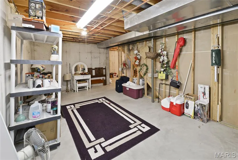 Concrete flooring with exposed ceiling joists and ductwork — 38 Fawn Valley Circle, St Peters, MO 63376