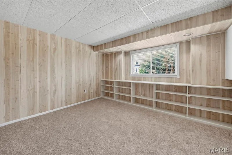 Rec Room with Bookshelves — 36 Lienemann Court, St Peters, MO 63303
