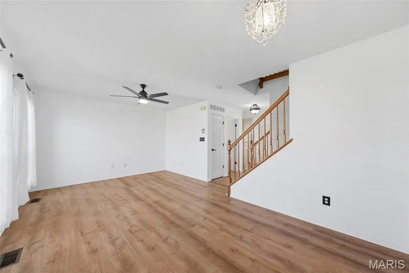 Beautiful vinyl floors throughtout main level — 744 Hyde Drive, O'Fallon, MO 63366