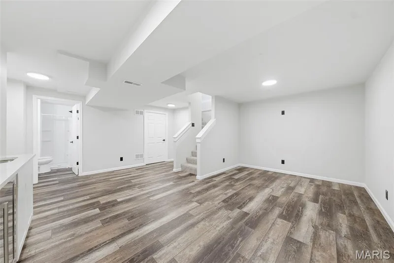 Recently finished lower level with vinyl floors — 744 Hyde Drive, O'Fallon, MO 63366