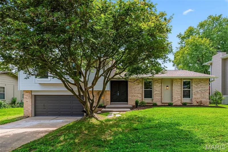 Beautifully updated, this 4 bedroom, 3 full bath multi level home in Willow Wood Estates offers over 1,550 square feet and 2 primary suites in the Francis Howell School District. — 3034 Willow Wood Drive, St Charles, MO 63303