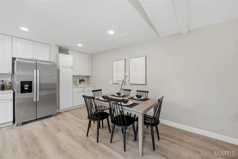 Conveniently located near the breakfast room, the kitchen’s coffee bar and built in pantry add function and storage to the space. — 3034 Willow Wood Drive, St Charles, MO 63303