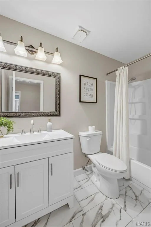 Upper level hall bath features an adult height vanity, LVT flooring, and convenient shower tub combination. — 3034 Willow Wood Drive, St Charles, MO 63303