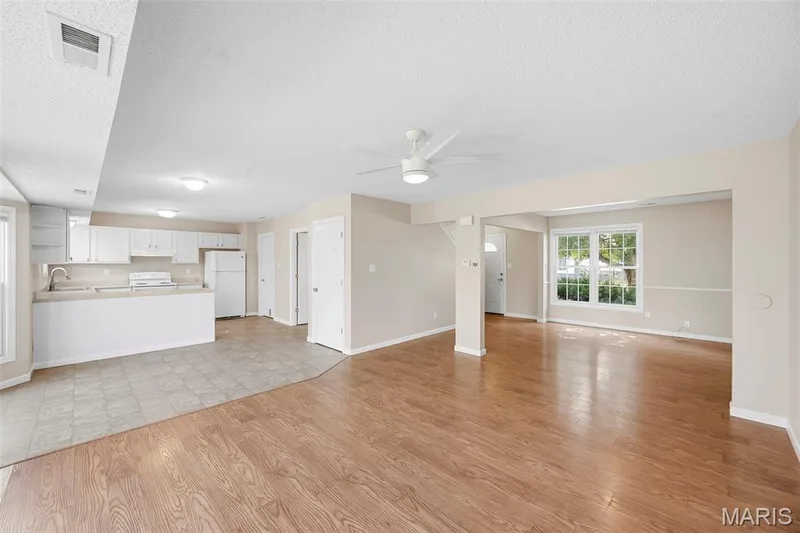 Easy care wood laminate flooring — 15 Tyler Court #2101A, Wentzville, MO 63385