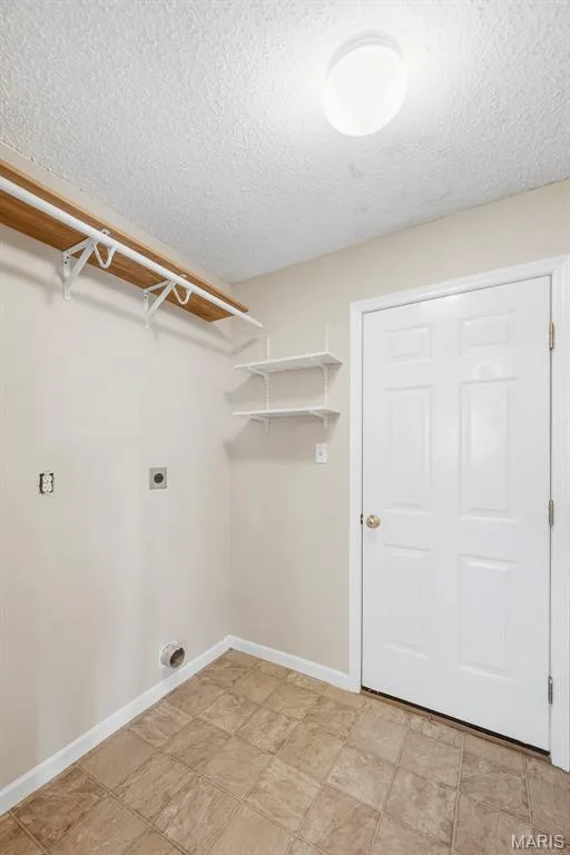 Main floor laundry room with access to garage — 15 Tyler Court #2101A, Wentzville, MO 63385