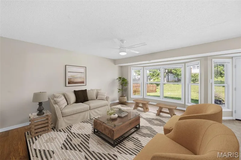 Large living room with big bay window — 15 Tyler Court #2101A, Wentzville, MO 63385