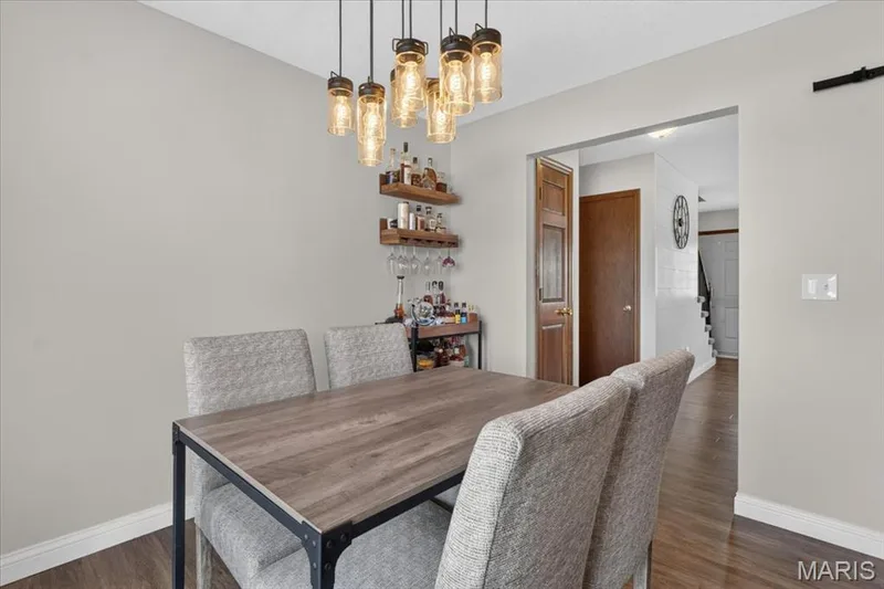 Wood-finish flooring throughout — 1383 Forest Creek Drive #5, St Charles, MO 63303