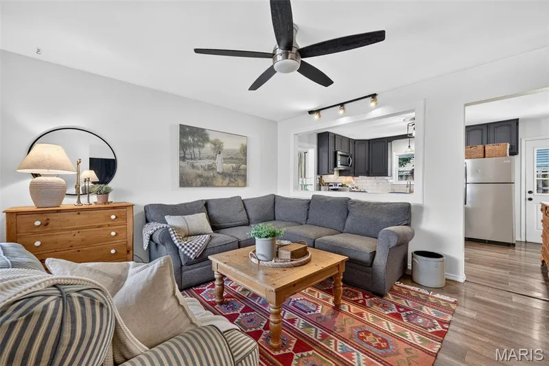 Wood-finish flooring, recessed lighting, and a ceiling fan — 402 Saint Joseph Avenue, St Charles, MO 63366