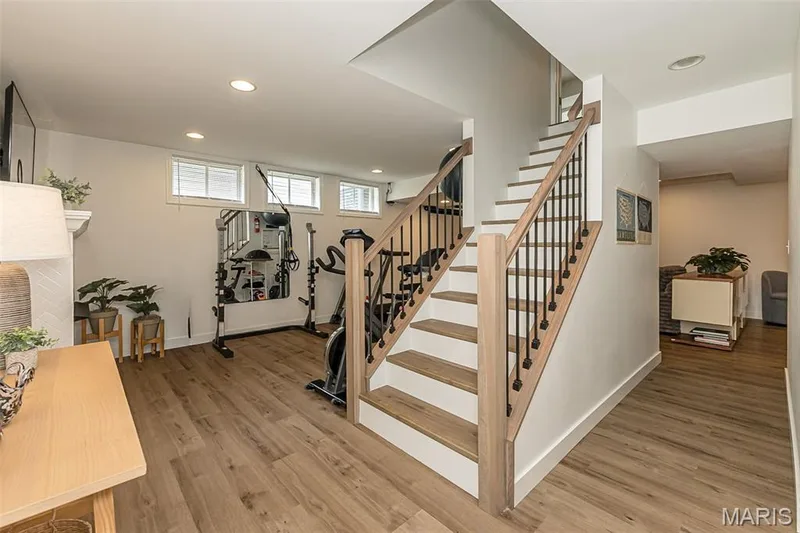 Finished lower level with updated staircase and flooring — 219 Cheval Square Drive, Chesterfield, MO 63005