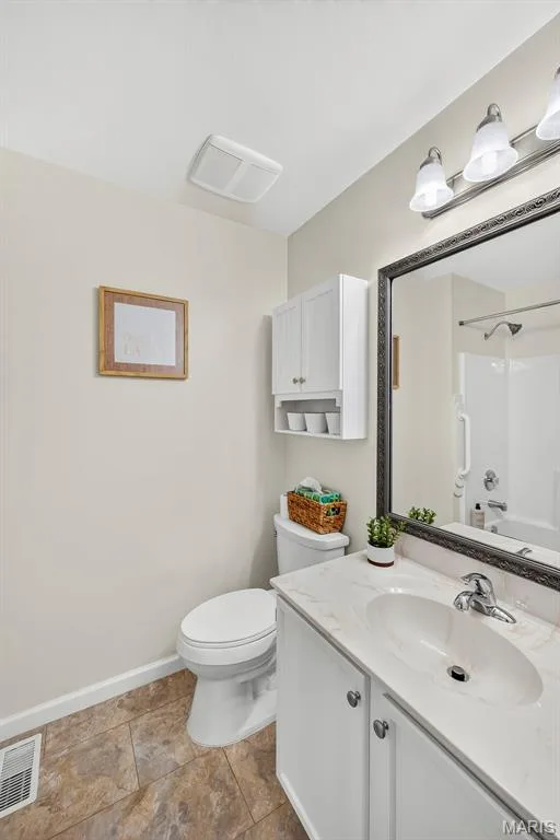 Hall bathroom has newer flooring, tub and shower combination. — 1761 Fairview Farms Circle, Wentzville, MO 63385