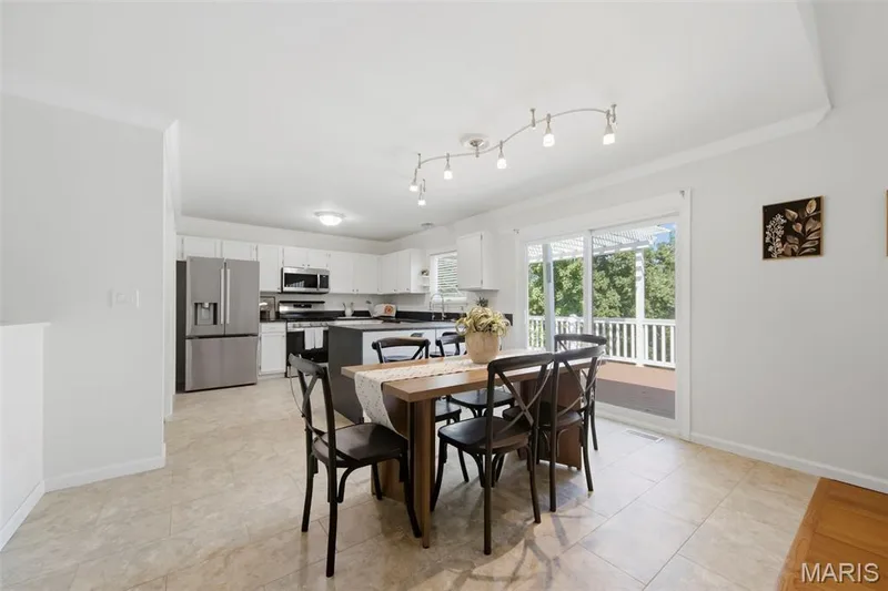 Dining is open to the kitchen and living room. — 1761 Fairview Farms Circle, Wentzville, MO 63385