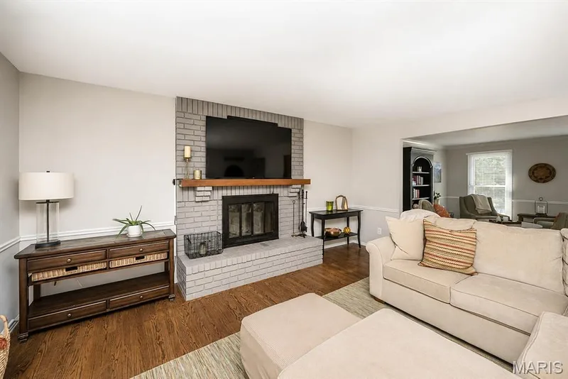 Family room looking towards living room — 15706 Heathercroft Drive, Chesterfield, MO 63017