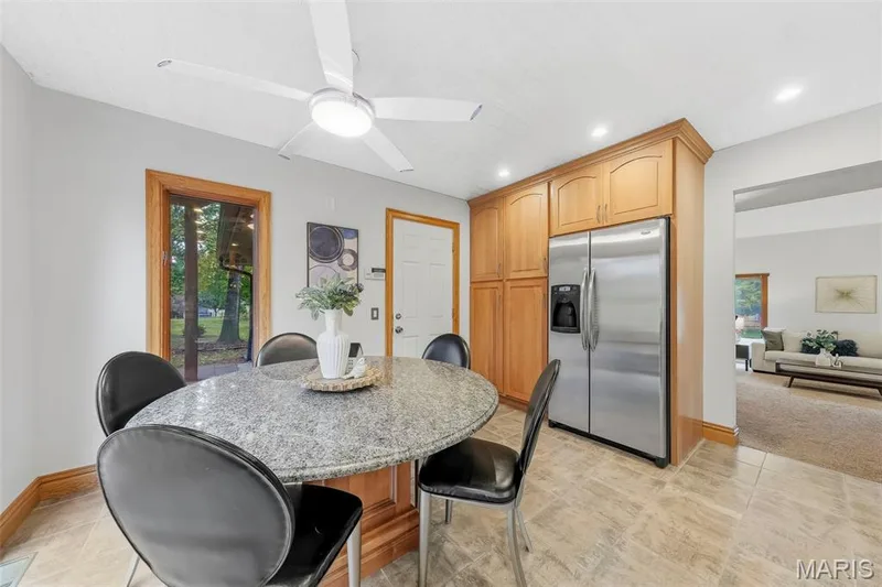 Beautiful custom kitchen with solid wood cabinets, solid wood millwork, stainless appliances and granite countertops. — 1028 Monfort Court, Lake St. Louis, MO 63367