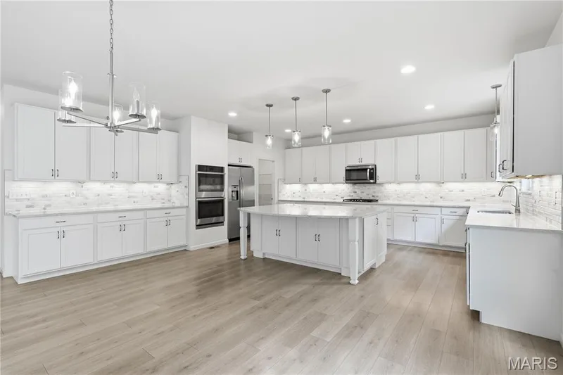 Large breakfast area which adjoins beautiful chefs kitchen — 1278 Harvester Drive, Chesterfield, MO 63005