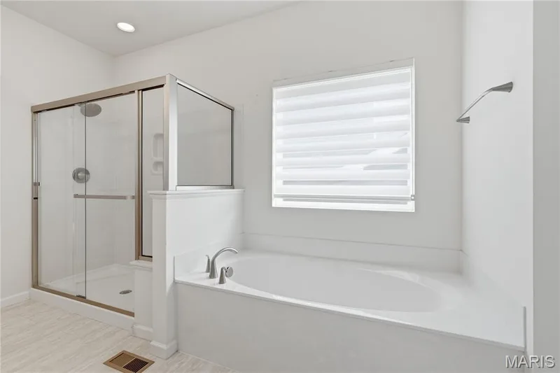 Primary bathroom has separate shower and bath — 1278 Harvester Drive, Chesterfield, MO 63005