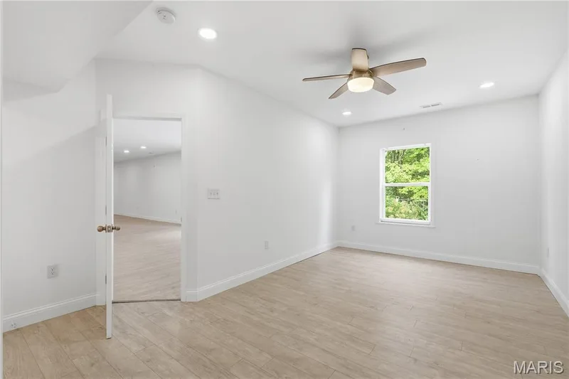 Lower level private guest suite with a walk-in closet — 1278 Harvester Drive, Chesterfield, MO 63005