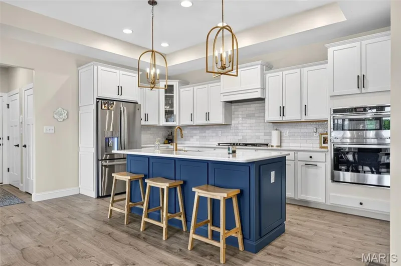 Coffered ceiling and custom lighting fixtures throughout — 155 Haven Ridge Court, Dardenne Prairie, MO 63368
