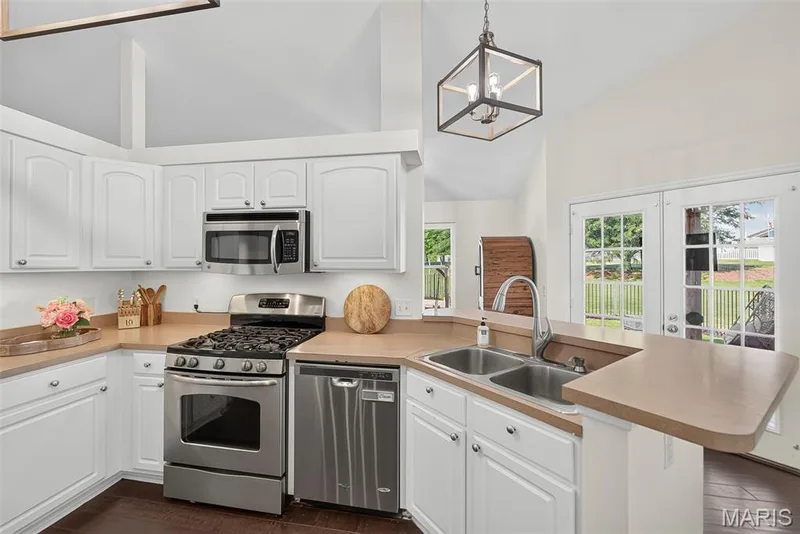 French doors to the backyard paradise — 1509 Langrove Drive, O'Fallon, MO 63368