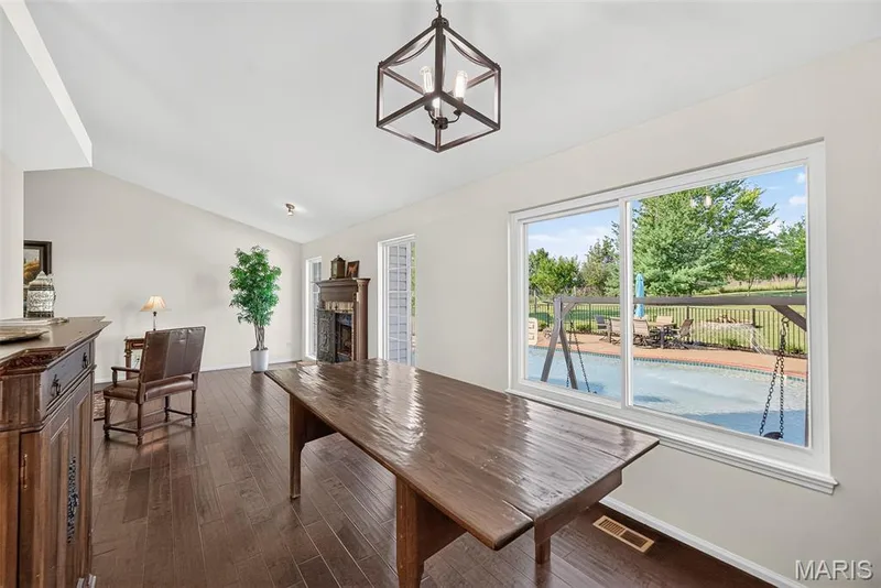 Dinning room overlooking the backyard and pool — 1509 Langrove Drive, O'Fallon, MO 63368