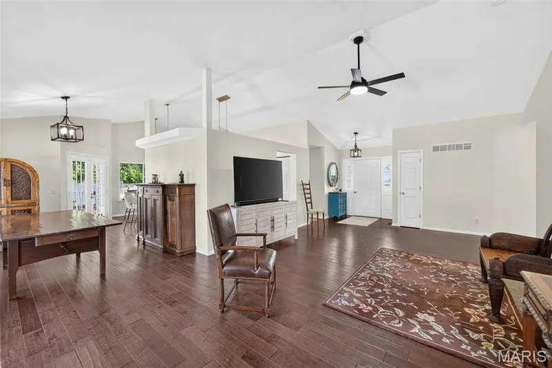 Living room with natural lighting and fireplace — 1509 Langrove Drive, O'Fallon, MO 63368