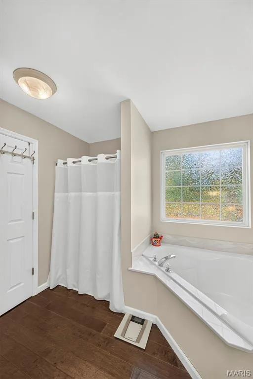 Separate shower and soaking tub, walk-in closet in primary bathroom — 1509 Langrove Drive, O'Fallon, MO 63368
