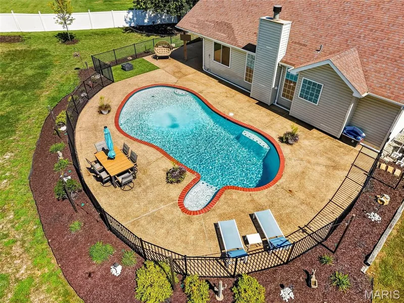 In-Ground pool with attached spa — 1509 Langrove Drive, O'Fallon, MO 63368