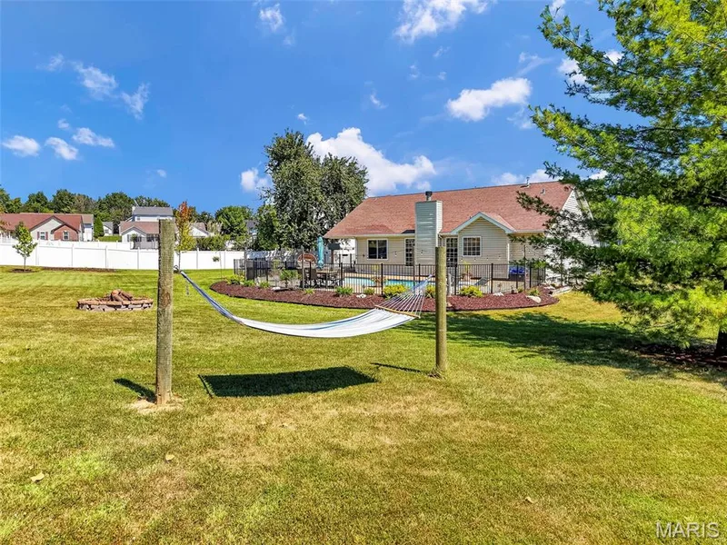 Hammock poles ready for a relaxing evening — 1509 Langrove Drive, O'Fallon, MO 63368