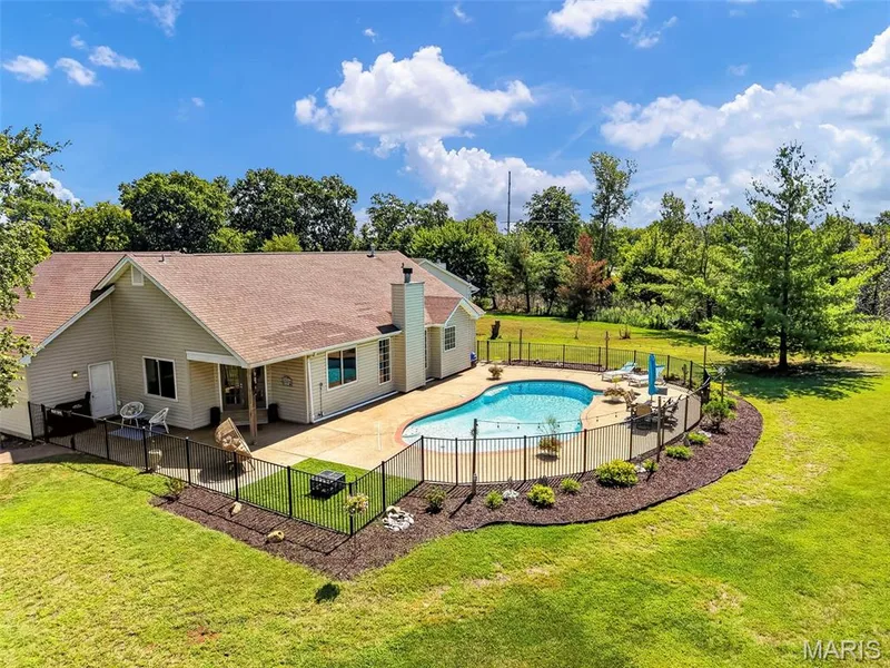 Fenced in pool area — 1509 Langrove Drive, O'Fallon, MO 63368