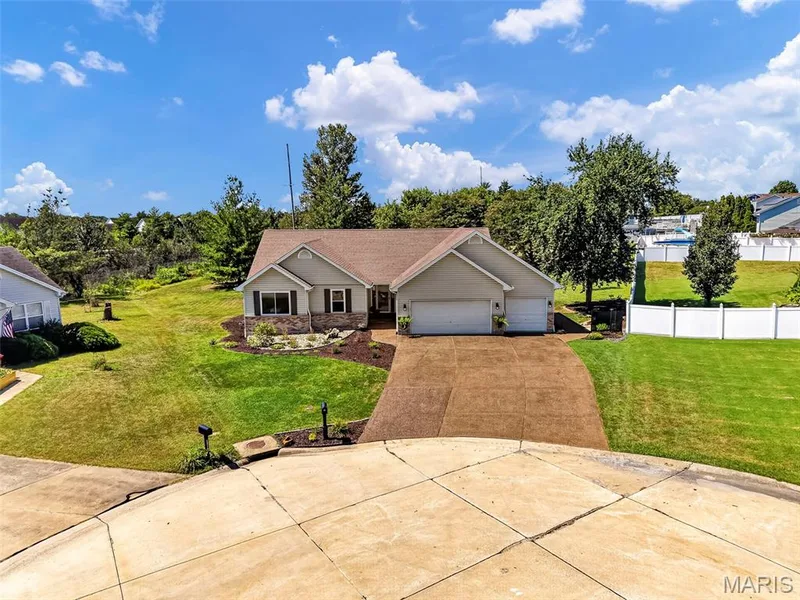 Front of the house leading into the cul-de-sac — 1509 Langrove Drive, O'Fallon, MO 63368