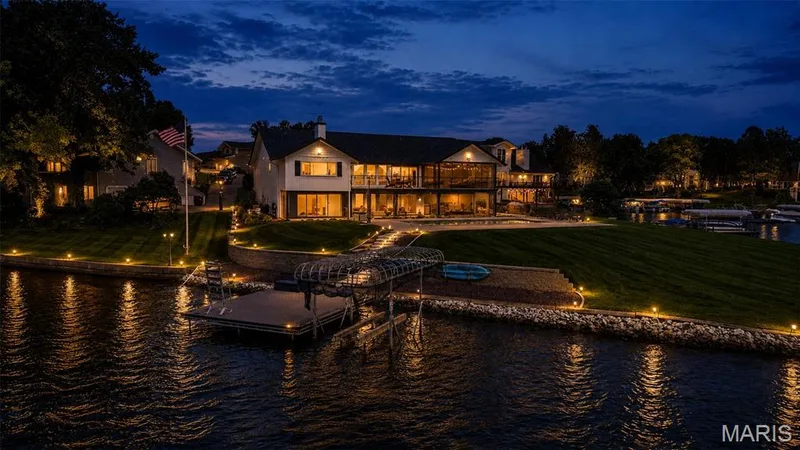 All of these nighttime photos are not Ai mages. WOW! This is real Life in Lake Saint Louis. — 22 Harbor Point Court, Lake St. Louis, MO 63367