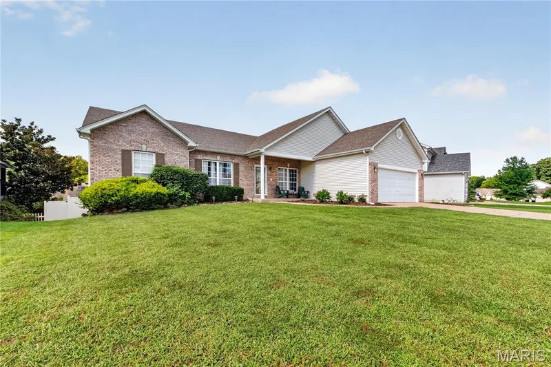 Brick and siding exterior with a gabled roof — 934 Annabrook Park Drive, O'Fallon, MO 63366
