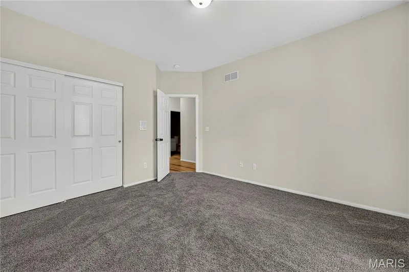 Wall-to-wall carpeting and neutral wall paint — 934 Annabrook Park Drive, O'Fallon, MO 63366