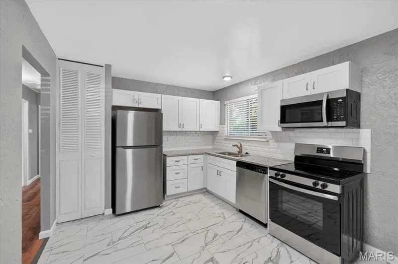 Updated eat-in kitchen. — 2428 Golfway Drive, St Charles, MO 63301