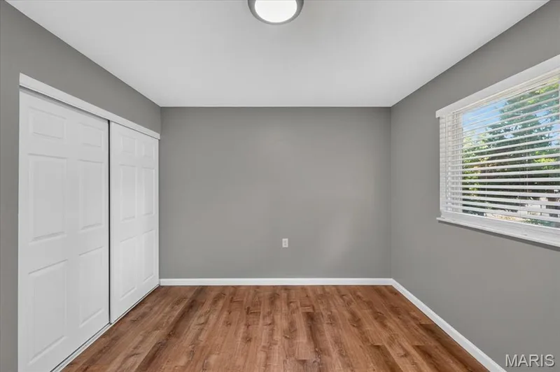 Luxury vinyl plank flooring runs throughout the home as do updated white 6 panel doors. — 2428 Golfway Drive, St Charles, MO 63301