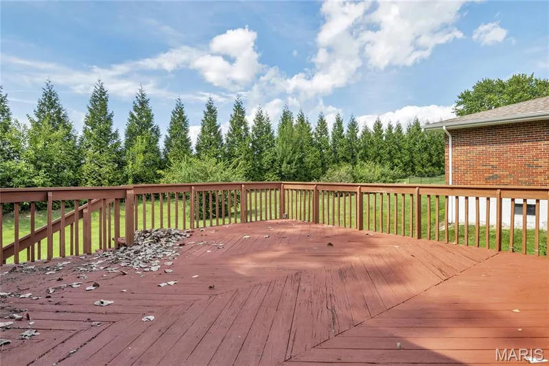 Large deck can be accessed from the garage. — 1401 Tamarack Drive, St Charles, MO 63301
