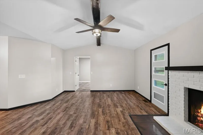 Newer paint, vaulted ceiling and attractive ceiling fan. — 1688 Knightwood Lane, O'Fallon, MO 63366